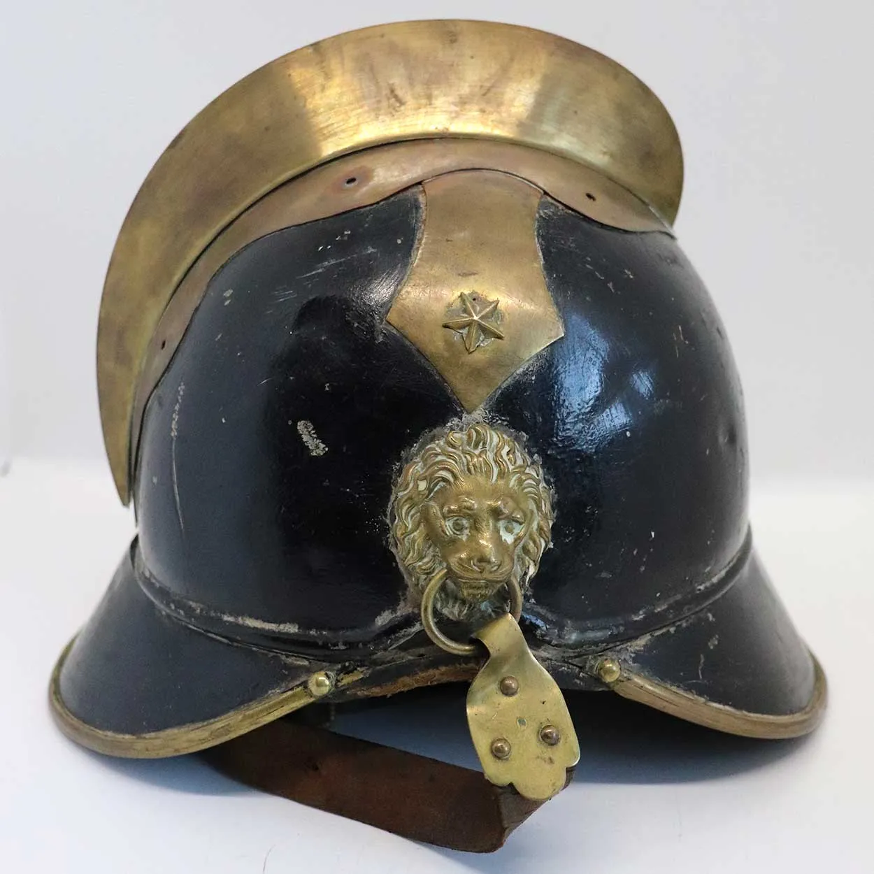 European Brass, Painted Iron and Leather Fire Brigade Helmet